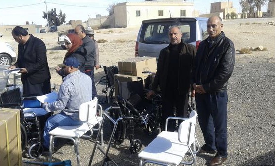 الطفيلة: توزيع معينات حركية في جرف الدراويش