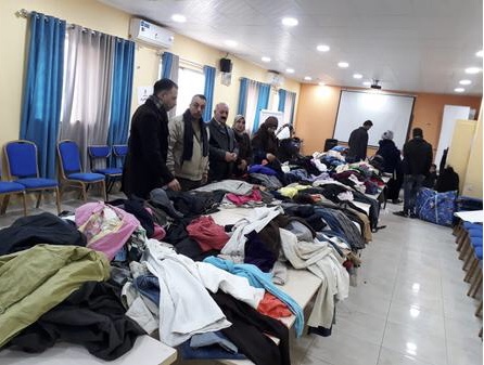 حملة لتوزيع الألبسة الشتوية على اللاجئين السوريين في الطفيلة   
